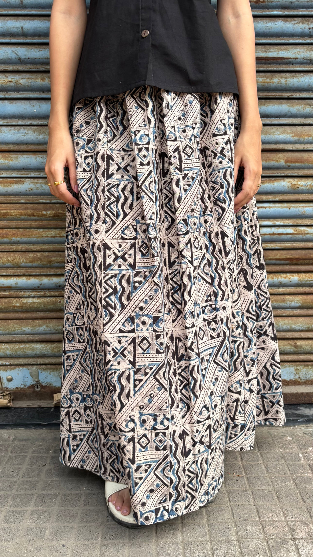 Black top with kalamkari skirt