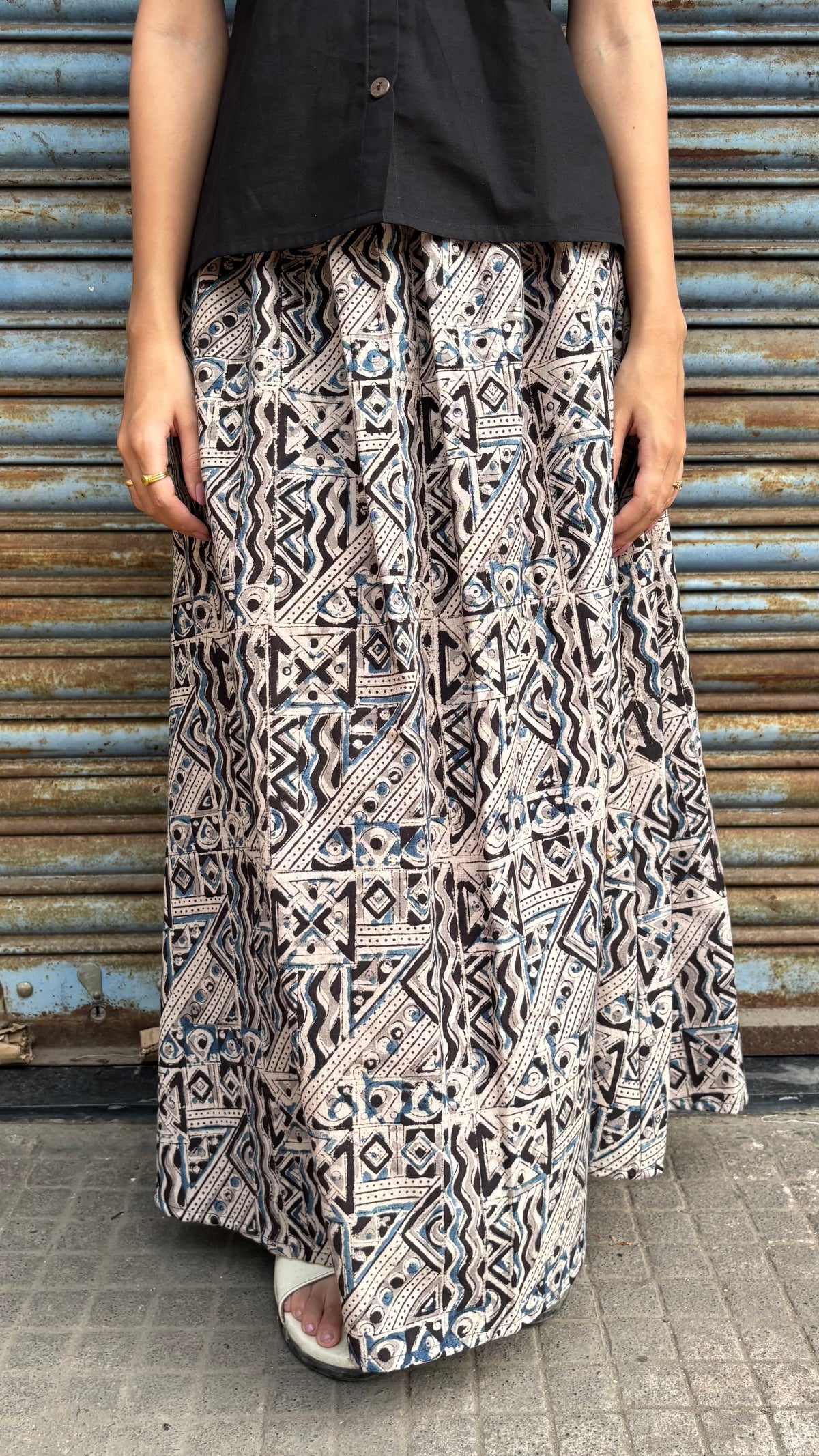 Black top with kalamkari skirt