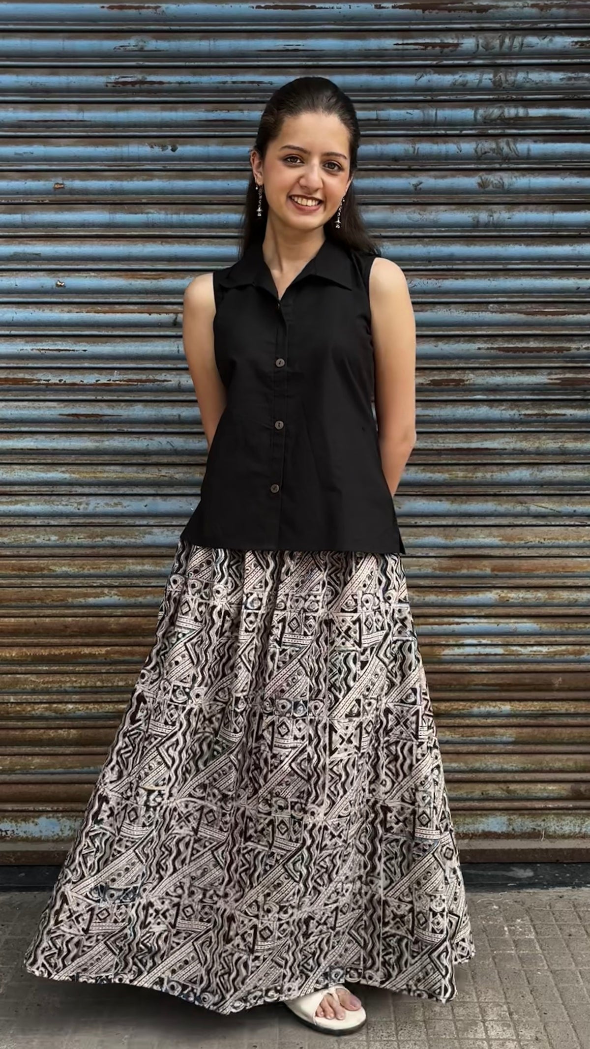 Black top with kalamkari skirt