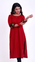 Red kurta with embroidery on sleeves